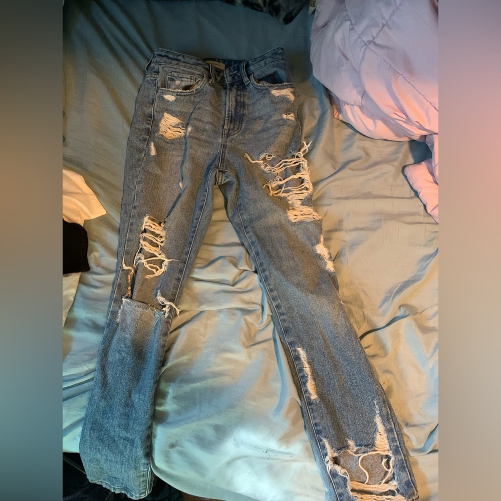 “Flying Monkey” jeans. They’re a bit baggy and they are ripped jeans. Women’s 24